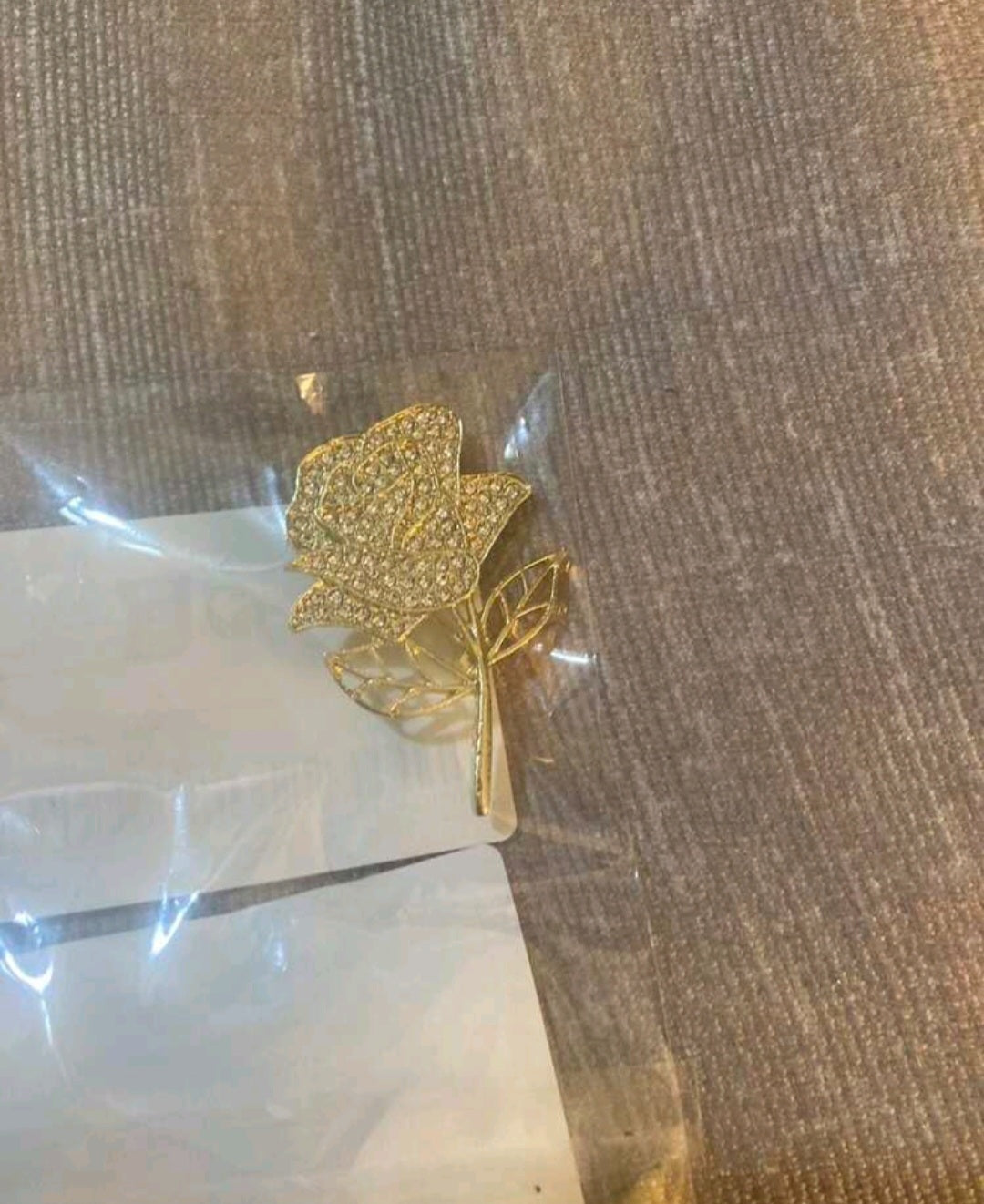 Gold flower brooch
