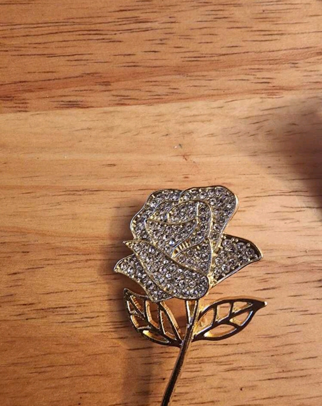Gold flower brooch