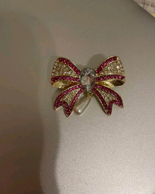 Bow tie brooch